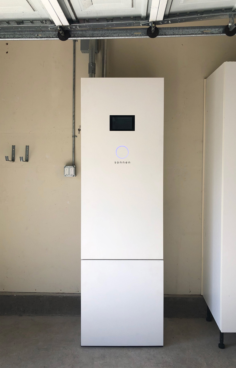 Rural solar battery storage system installed in a garage